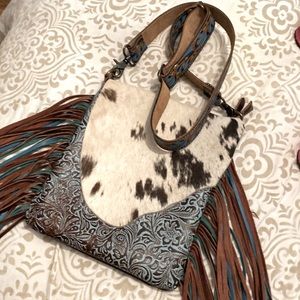 Barely used cow print Fringe  brown and turquoise concealed carry Myra bag